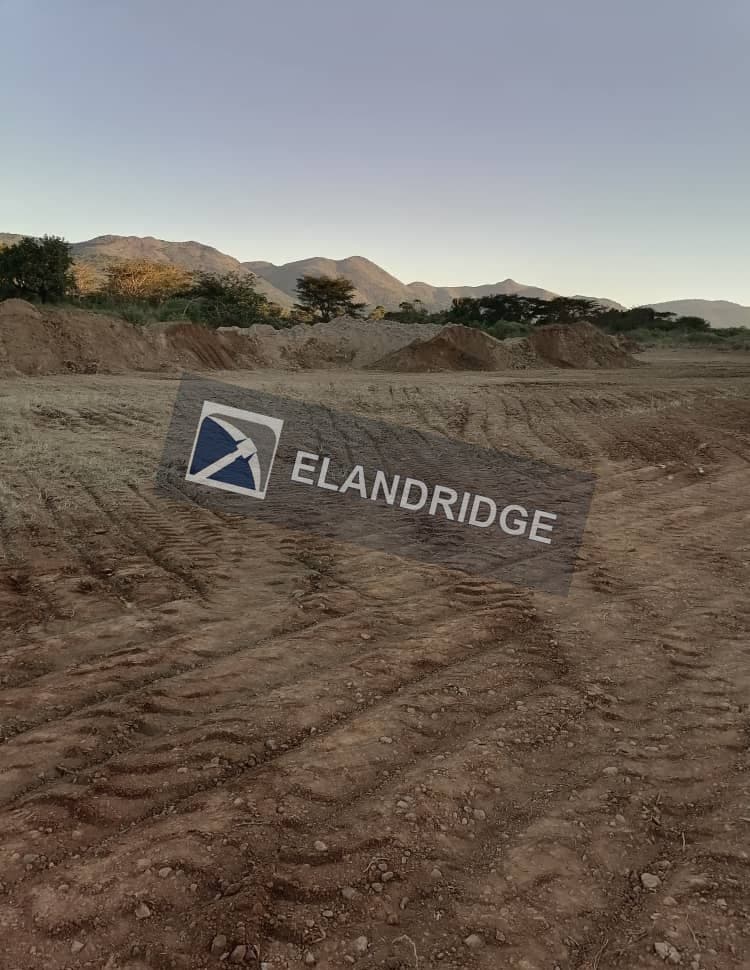 Compacted pad surface with machinery tracks